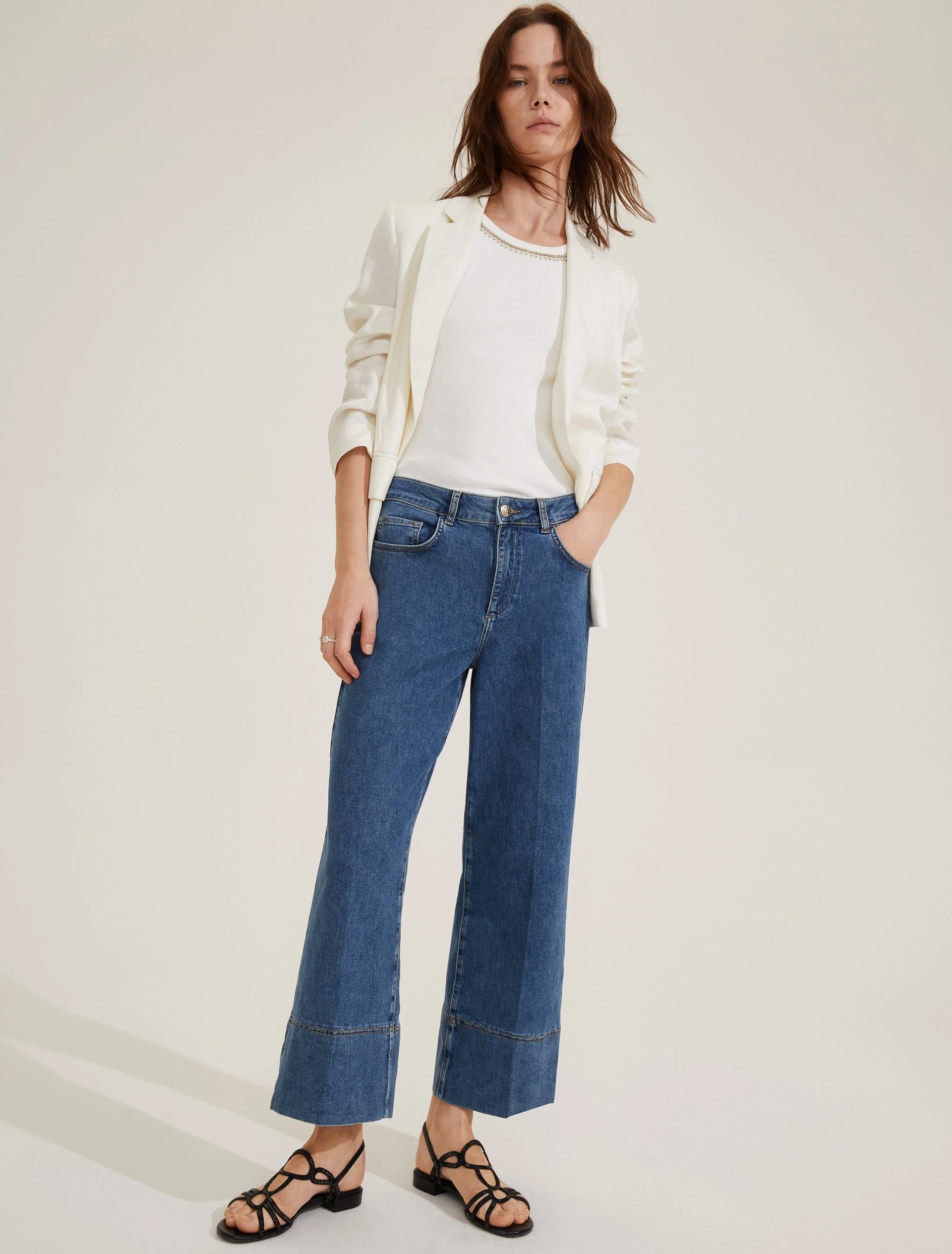 Jeans in denim stretch con dettagli sartoriali