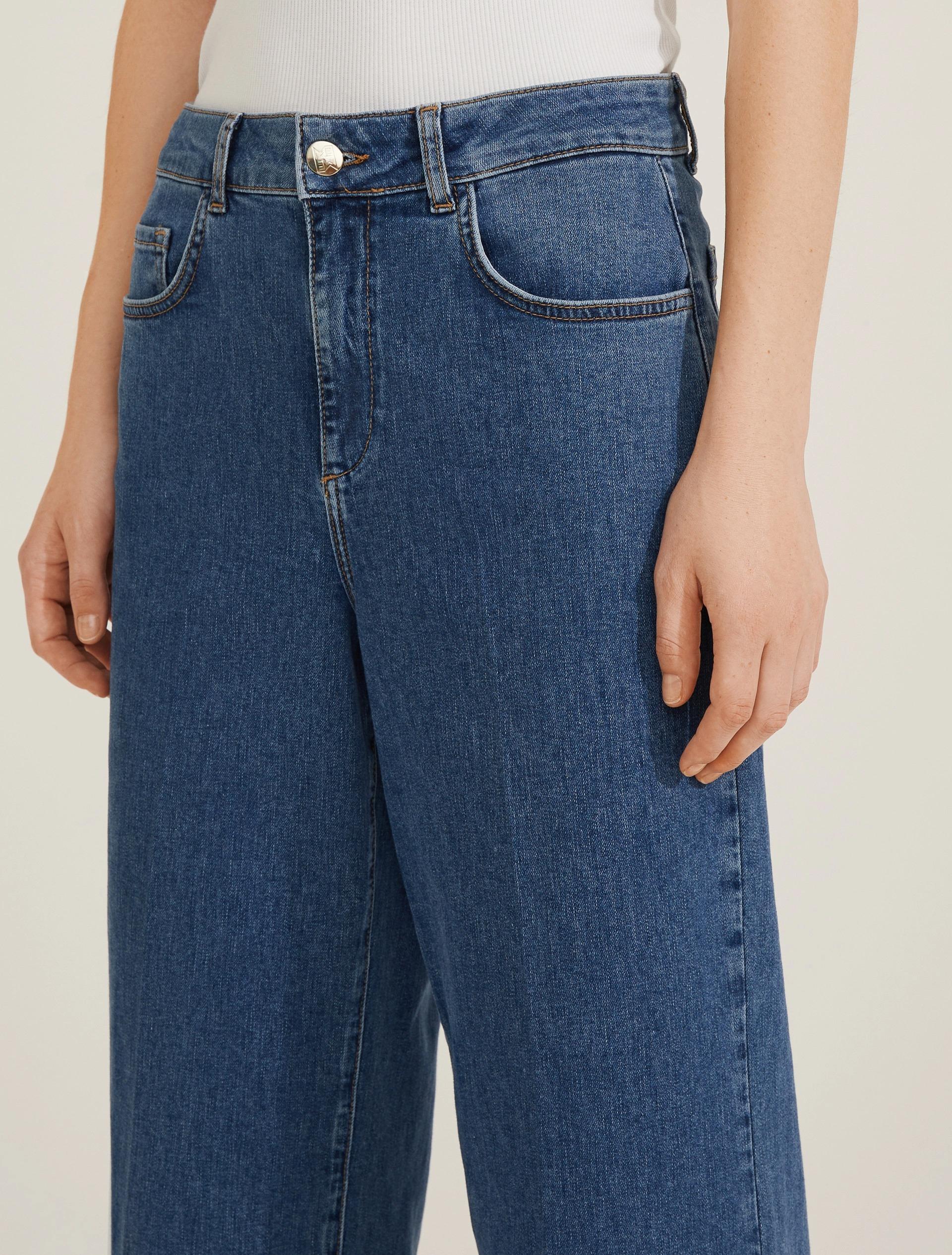 Jeans in denim stretch con dettagli sartoriali